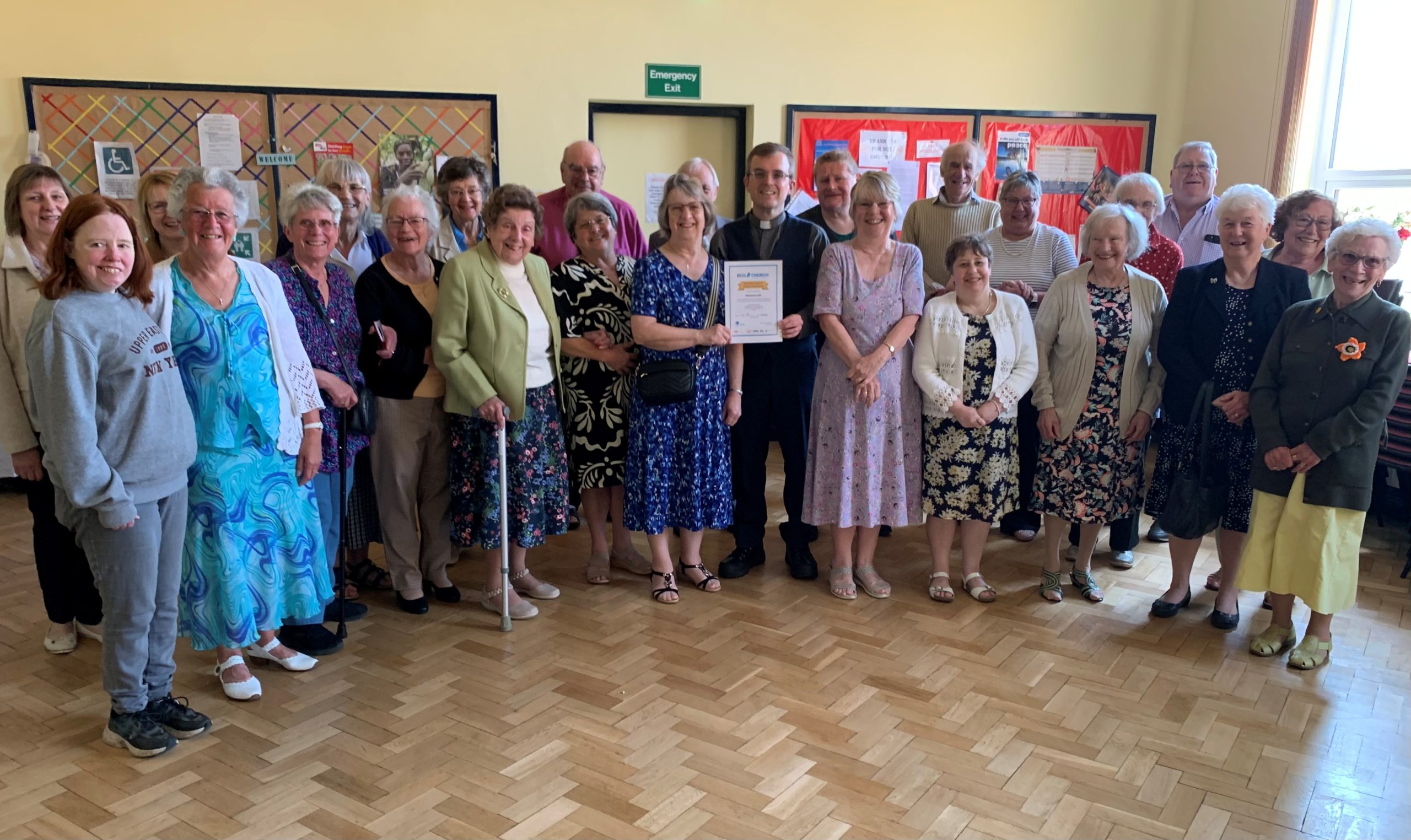 Photo of congregants at Wombourne celebrating achieving their gold eco award. 